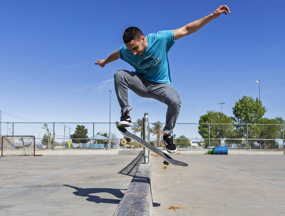 Tony Bitz does an ollie over a wall at Desert Breeze Park on Saturday, April 4, 2020, in Las Ve ...