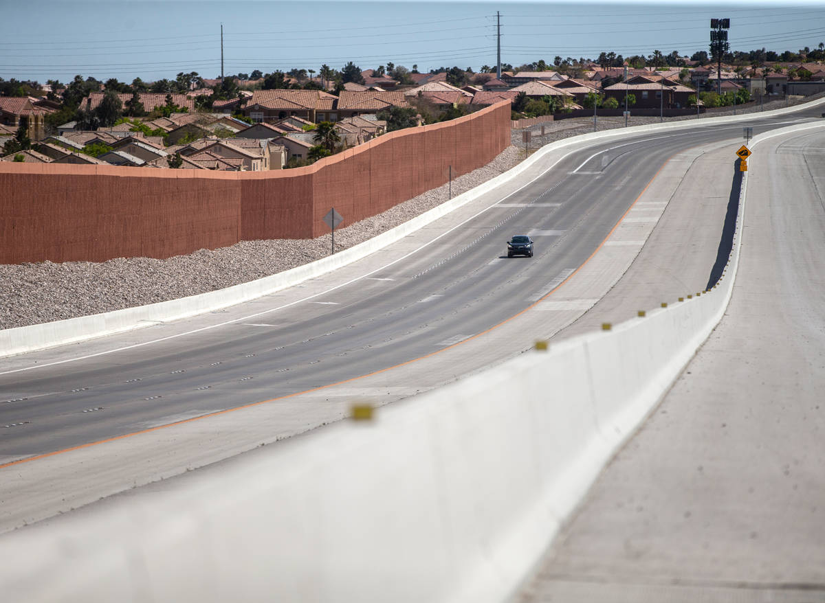 A single car drives on I-215 north near Lone Mountain Road on Saturday, April 4, 2020, in Las V ...