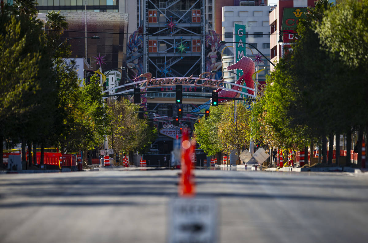 A view looking down Fremont East as traffic remains light in the wake of the closure of a stay- ...