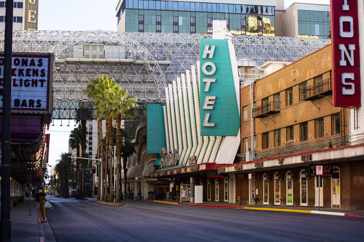 A view looking down Casino Center Boulevard near Fremont Street as traffic remains light in the ...