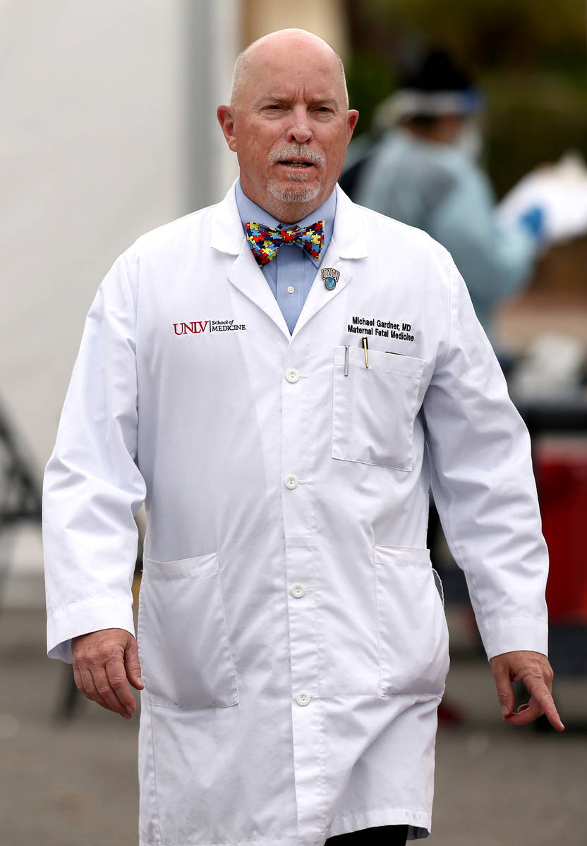 Dr. Michael Gardner, Vice Dean of Clinical Affairs at UNLV School of Medicine during curbside t ...