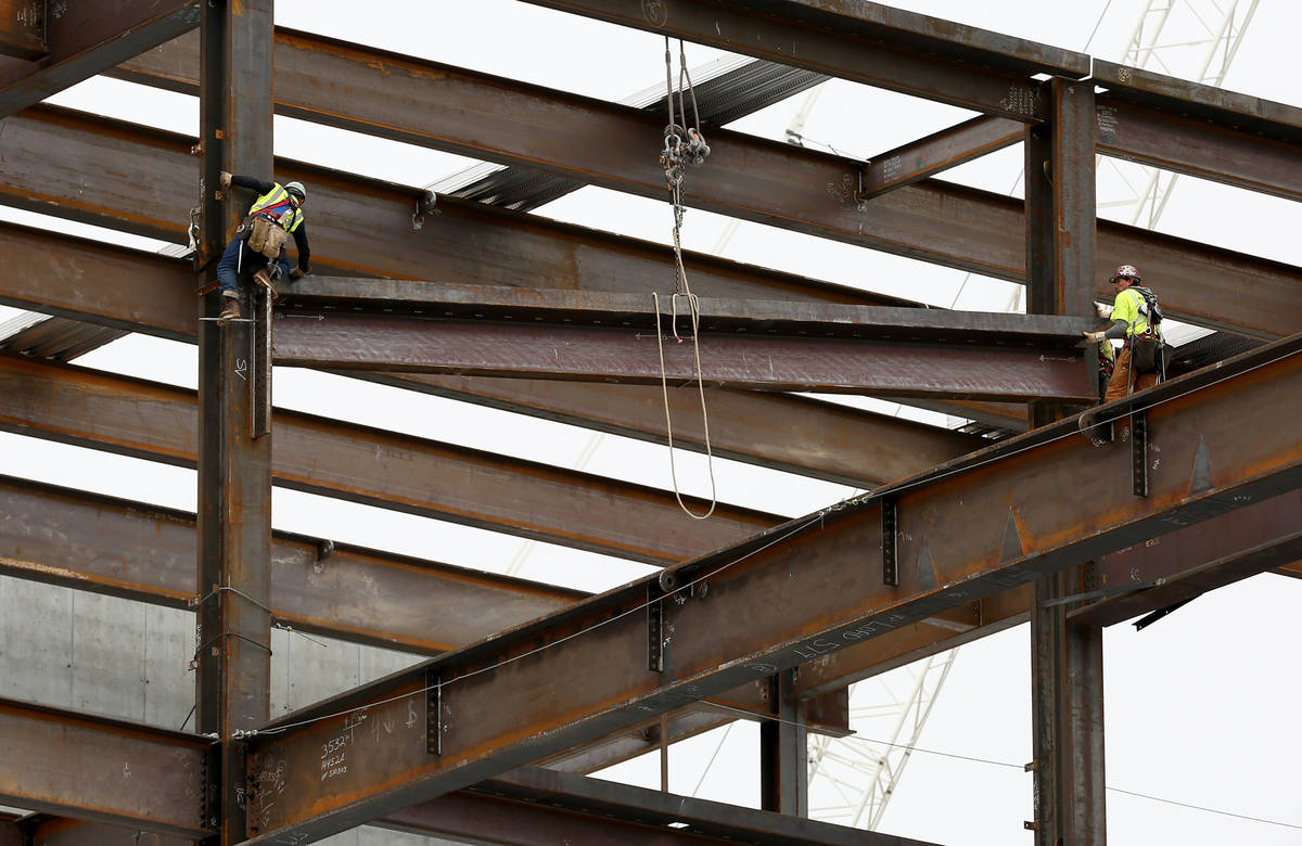 Work continues at Resorts World after the construction site confirmed more cases of COVID-19 am ...