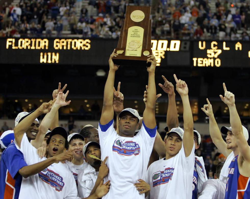 Florida players celebrate their 73-57 win over UCLA in the Final Four national championship ba ...