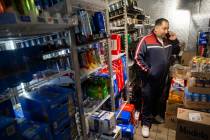 Operations manager Kevork Nersessian talks to a supplier in his depleted cooler at Liquor Empor ...