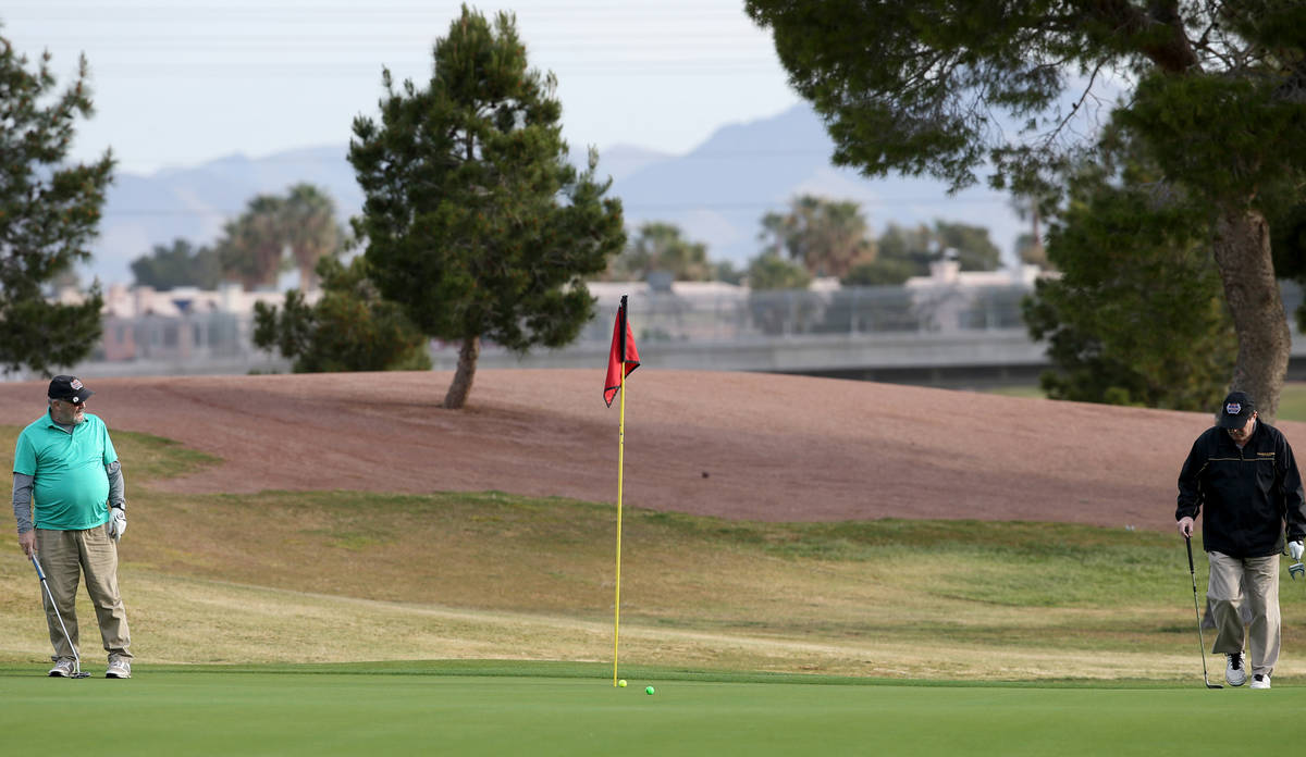 Golfers at The Club at Sunrise Wednesday, April 8, 2020. Golf courses have closed clubhouses an ...