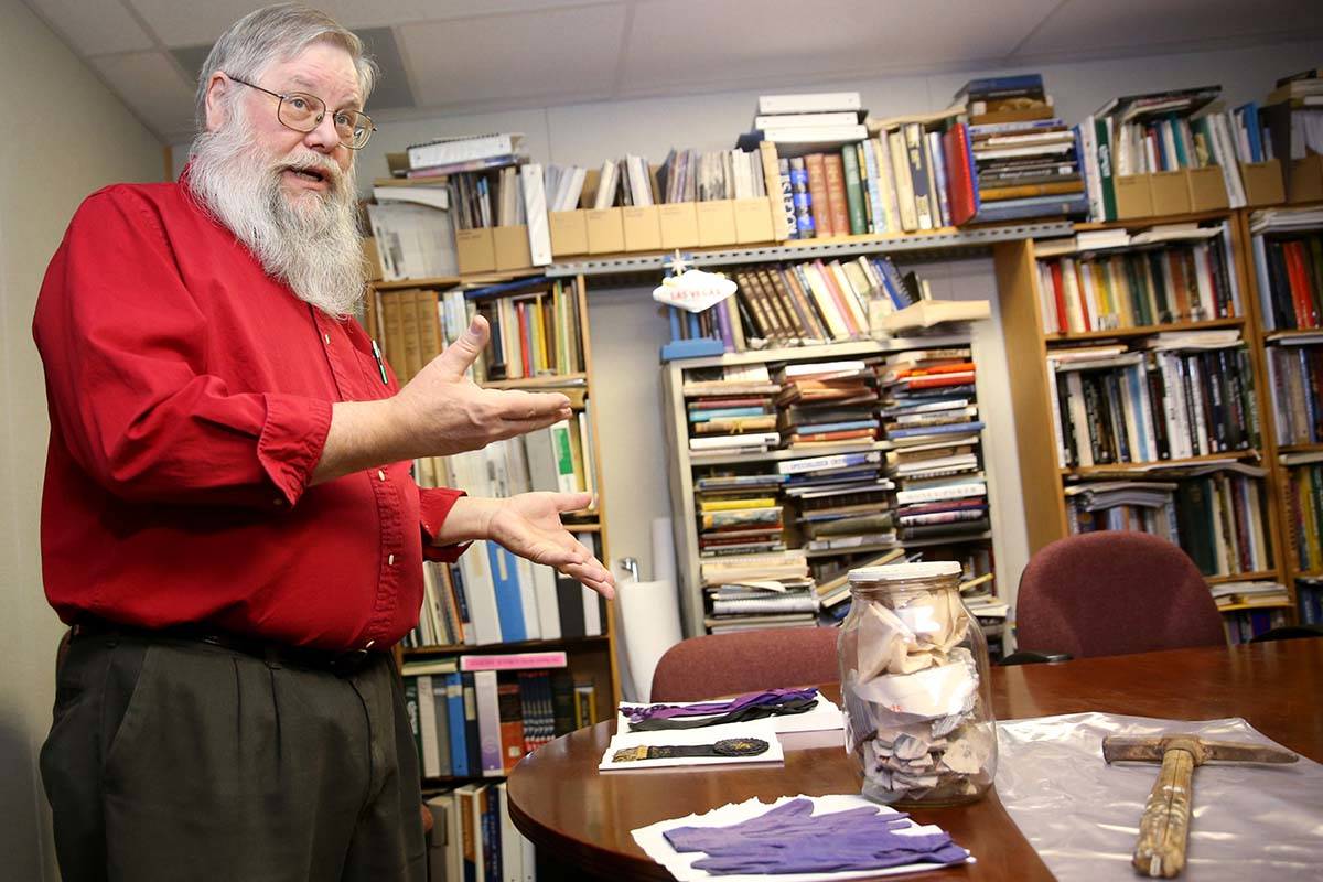 Clark County Museum Administrator Mark Hall-Patton shows items from the Anna Roberts Parks coll ...
