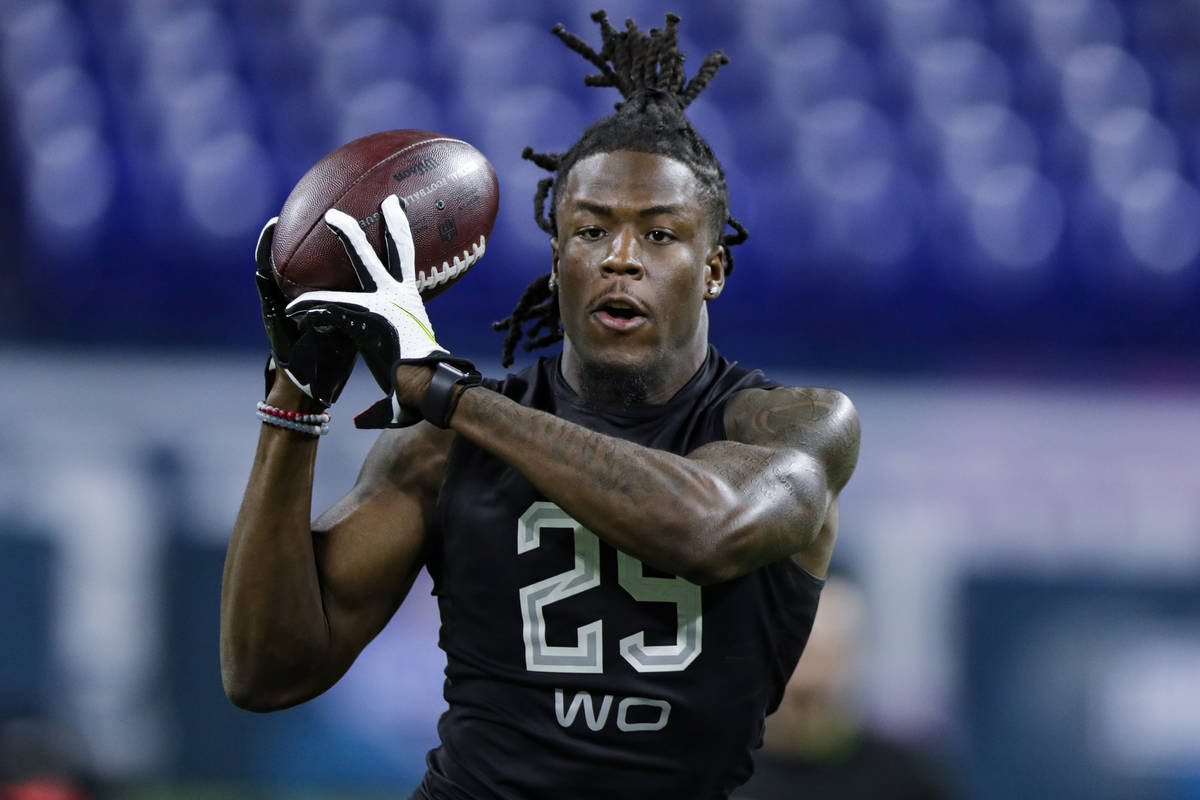 Alabama wide receiver Jerry Jeudy runs a drill at the NFL football scouting combine in Indianap ...