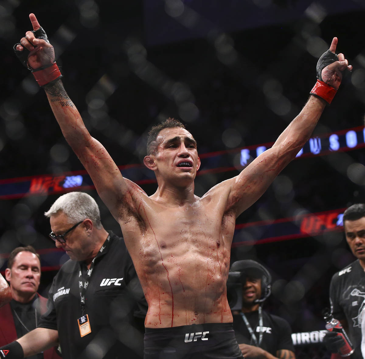 Tony Ferguson celebrates his defeat over Anthony Pettis during their lightweight bout at UFC 22 ...