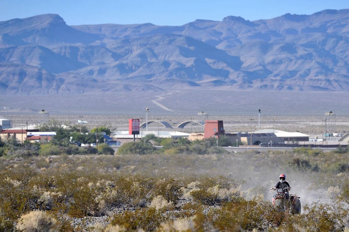 An off-road rider travels along a dirt trail in the desert area in Indian Springs in October 20 ...