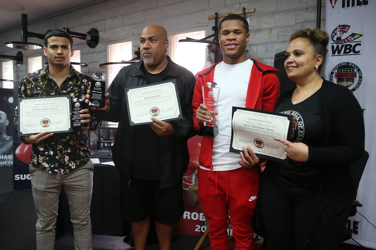 Rolando Romero, from left, boxing prospect of the year, Saalim Raoof, accepting the award for h ...