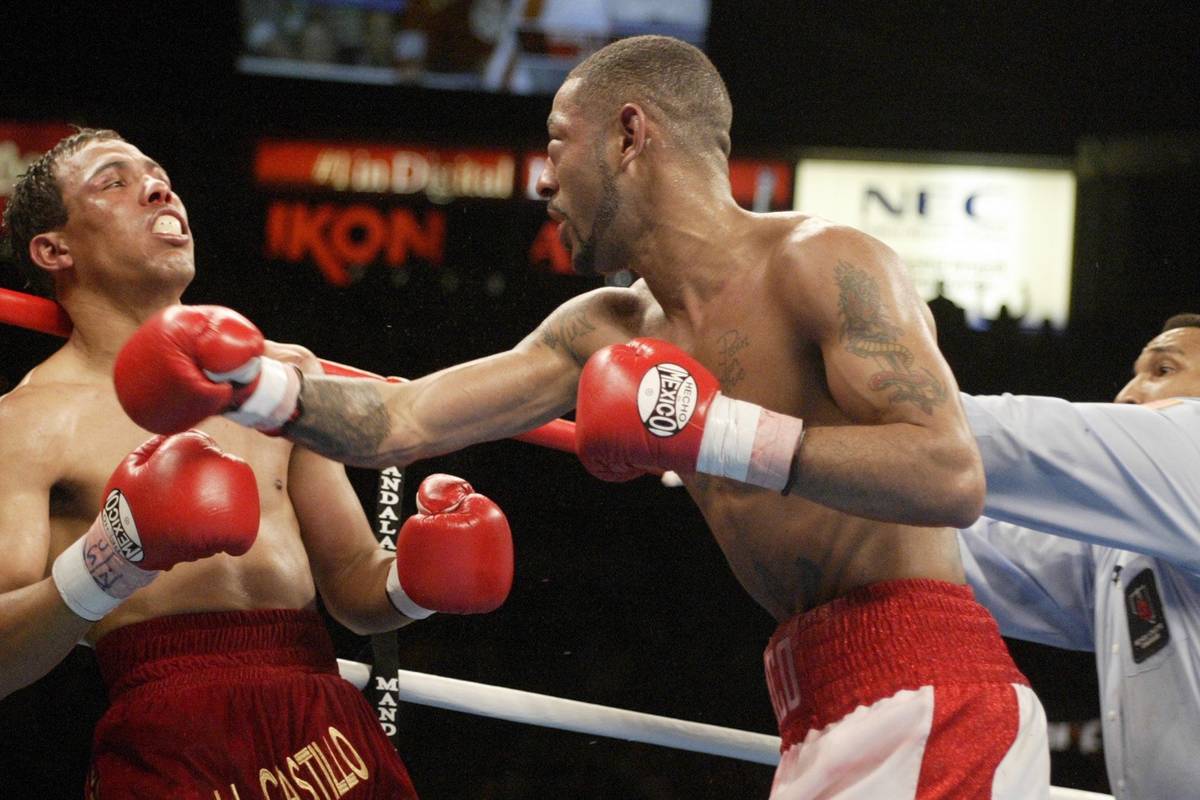 Official Tony Weeks, rights steps in after Diego Corrales lands his final punch on Jose Luis Ca ...