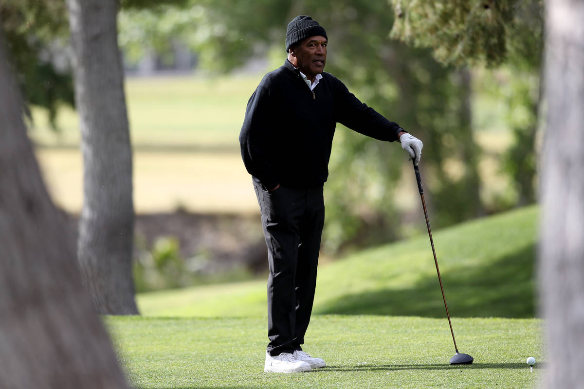 O.J. Simpson prepares to tee off on the seventh hole at Las Vegas National Golf Club Wednesday, ...
