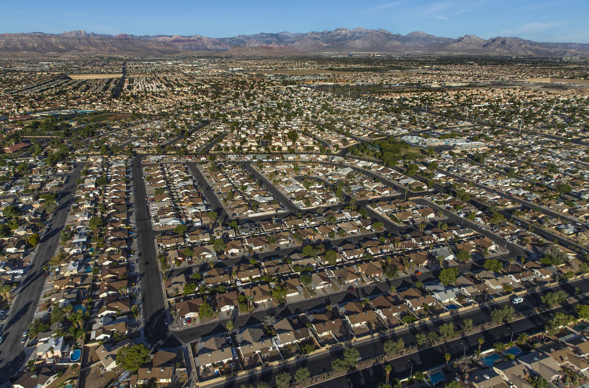 A view looking west with the Red Rock National Conservation Area in the distance during an aeri ...