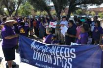 Members of the Service Employees International Union picket outside the Las Vegas Review-Journa ...