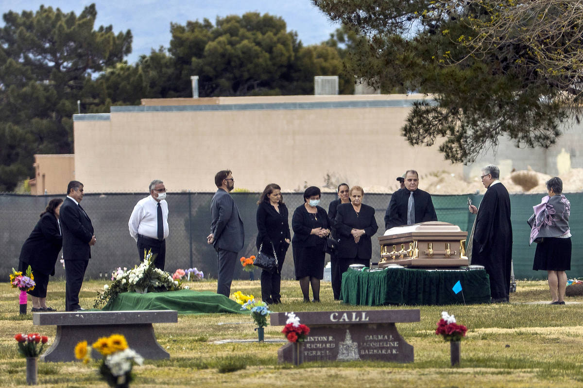 A funeral takes place at the Davis Funeral Home Cemetery on Monday, April 6, 2020, in Las Vegas ...