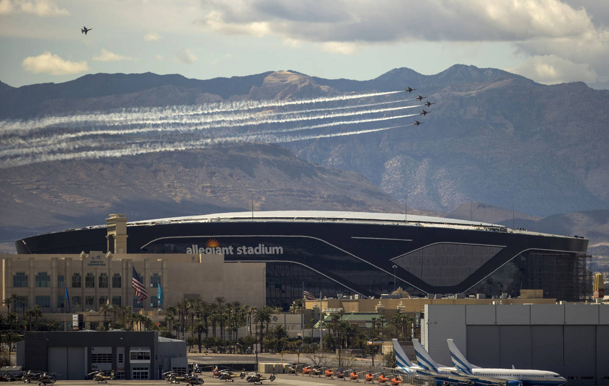 The U.S. Air Force Air Demonstration Squadron "Thunderbirds" soar past Allegiant Stadium during ...