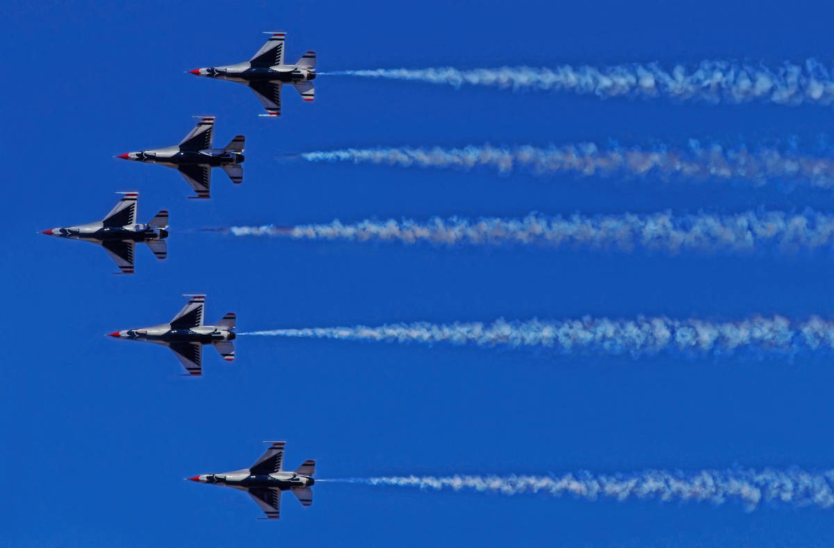 Six F-16 Fighting Falcons with the U.S. Air Force Air Demonstration Squadron Thunderbirds fly o ...