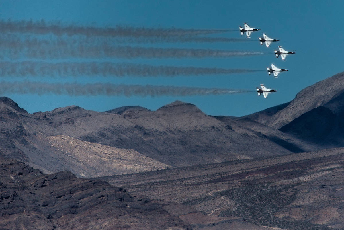 Six F-16 Fighting Falcons with the U.S. Air Force Air Demonstration Squadron Thunderbirds fly o ...