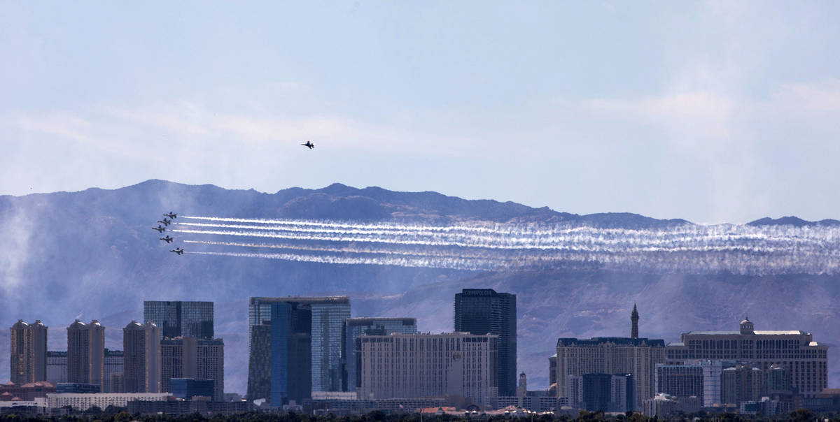 The U.S. Air Force Air Demonstration Squadron, the “Thunderbirds” flies over the Strip in h ...