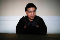 Funeral director Jesus Pujols is photographed in one of the funeral homes he works with during ...