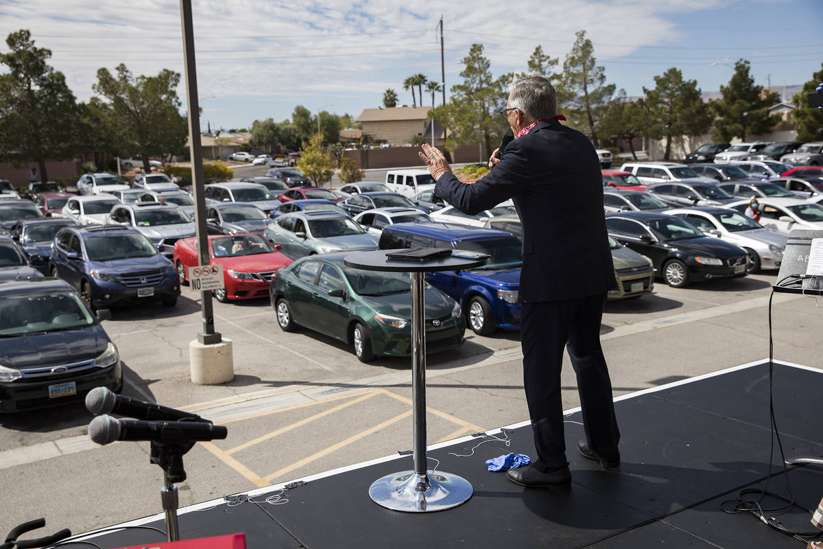 Pastor Paul Marc Goulet leads an Easter service in the parking lot at International Church of L ...