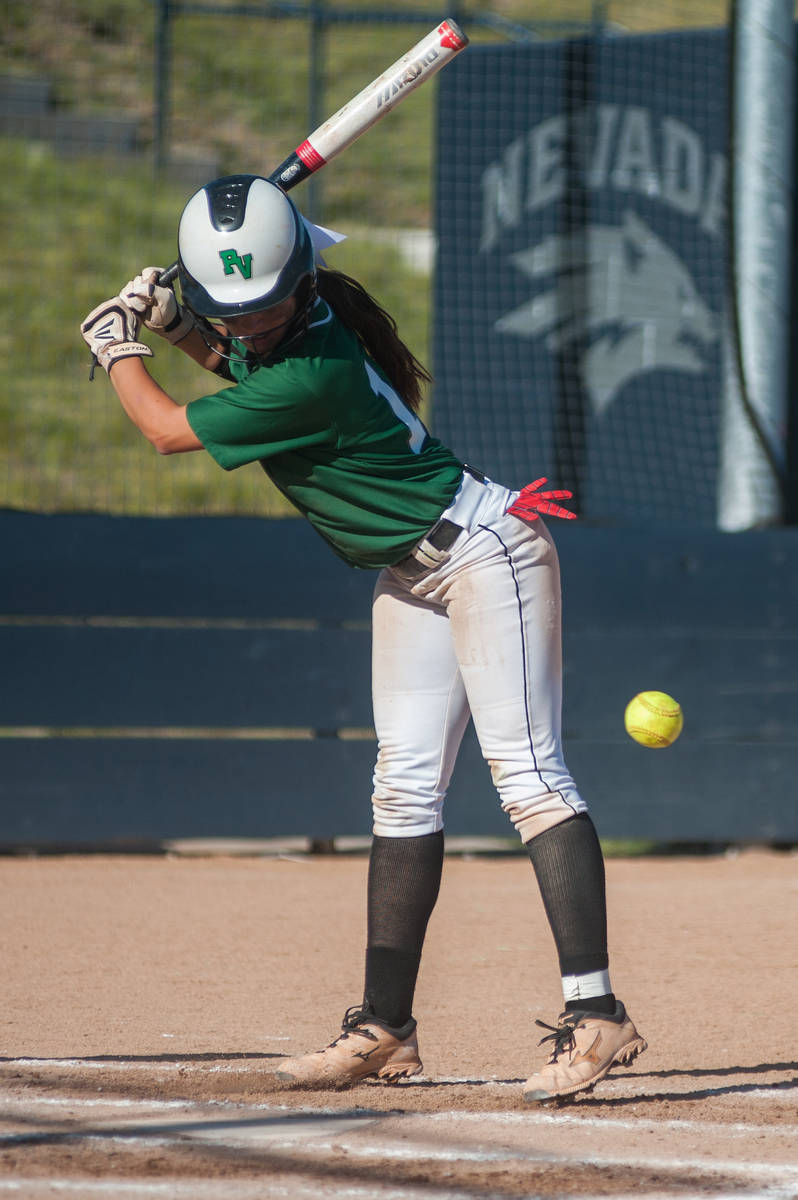 Palo Verde's Haley Harrison dodges a close pitch while playing against Reed in the deciding gam ...