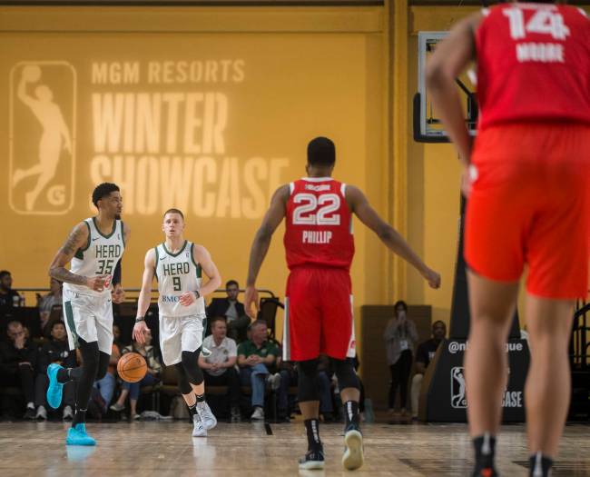 Wisconsin Herd forward Donte DiVincenzo (9) pushes the ball up court in the fourth quarter agai ...