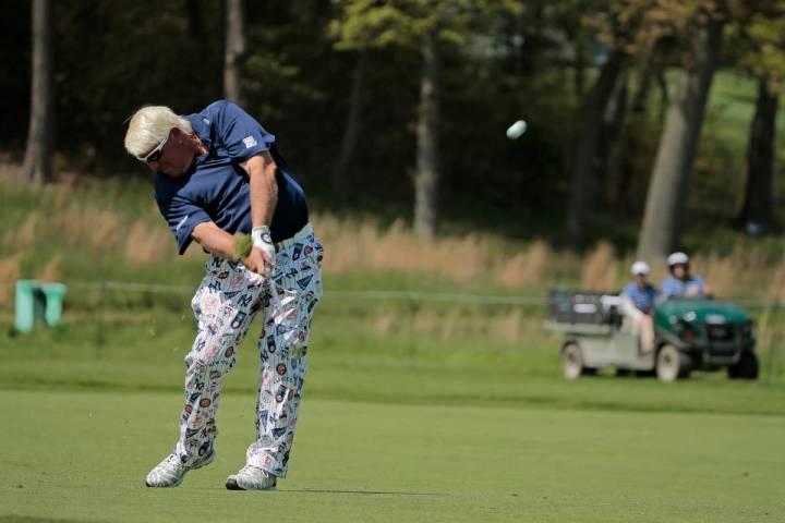 John Daly hits off the 16th fairway during the first round of the PGA Championship golf tournam ...