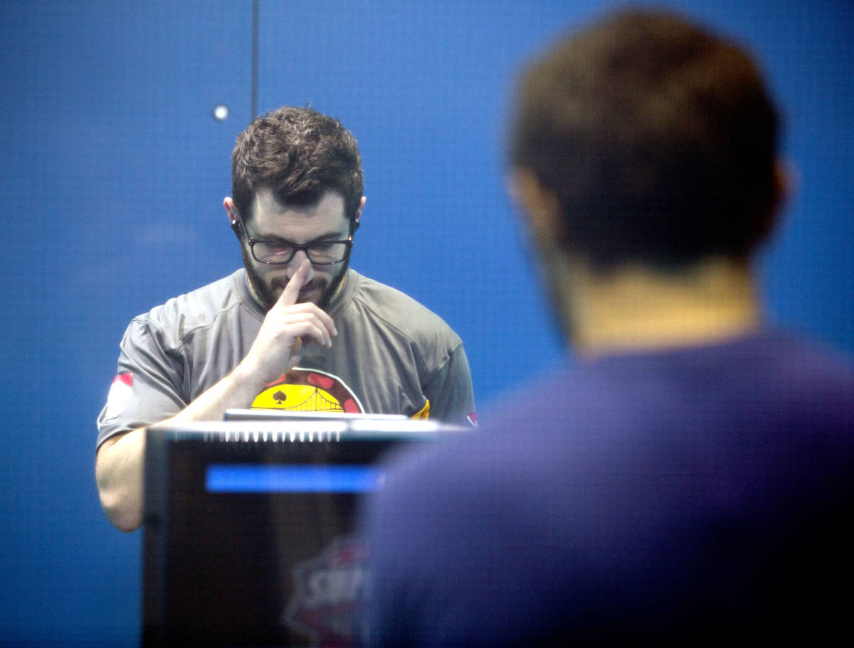 Phil Galfond, left, with the San Francisco Rush, studies his next move while playing video poke ...