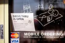 A sign is seen hanging on the door of the Coffee Bean & Tea Leaf at 6115 S Rainbow Blvd., adver ...