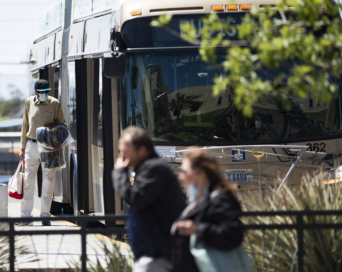 Passengers got off and on the bus at the Bonneville Transit Center in Las Vegas, Tuesday, April ...