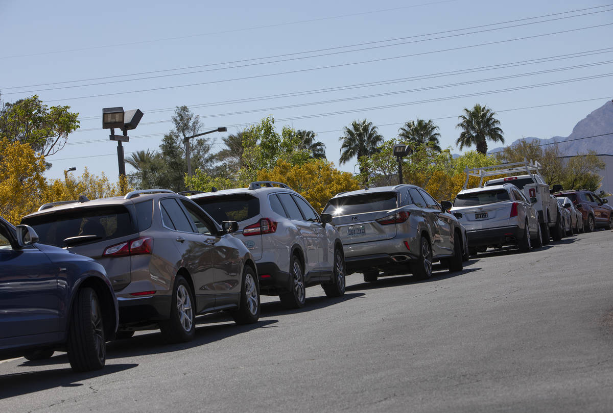 Cars line up for drive-through COVID-19 antibody testing outside PAM Speciality Hospital on Tue ...