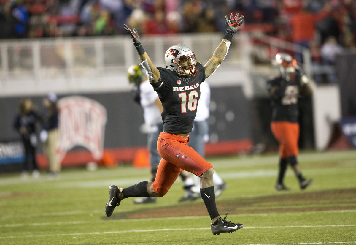 UNLV Rebels linebacker Javin White (16) celebrates his interceptions against the Nevada Wolf Pa ...