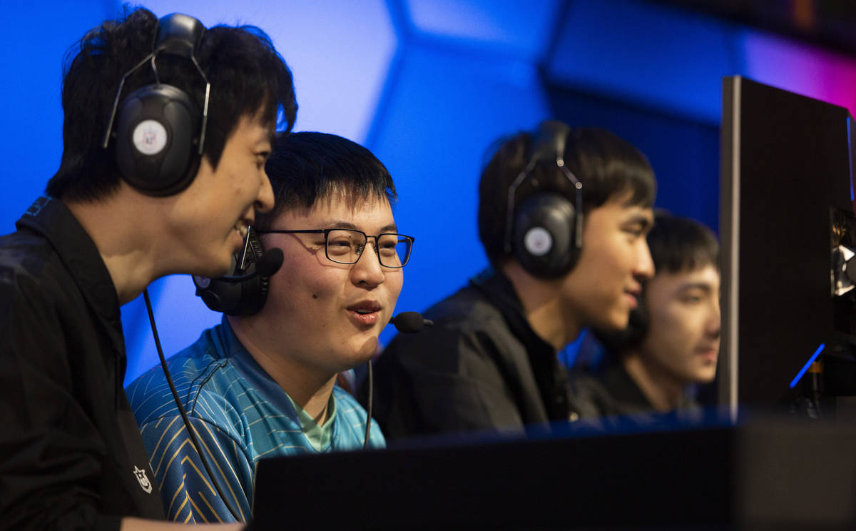 Xiao Wang, left, and Jian Zihao, second from left, known together as UziGod, play tandem League ...