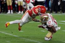 Kansas City Chiefs' Tyrann Mathieu (32) tackles San Francisco 49ers' Emmanuel Sanders (17) duri ...