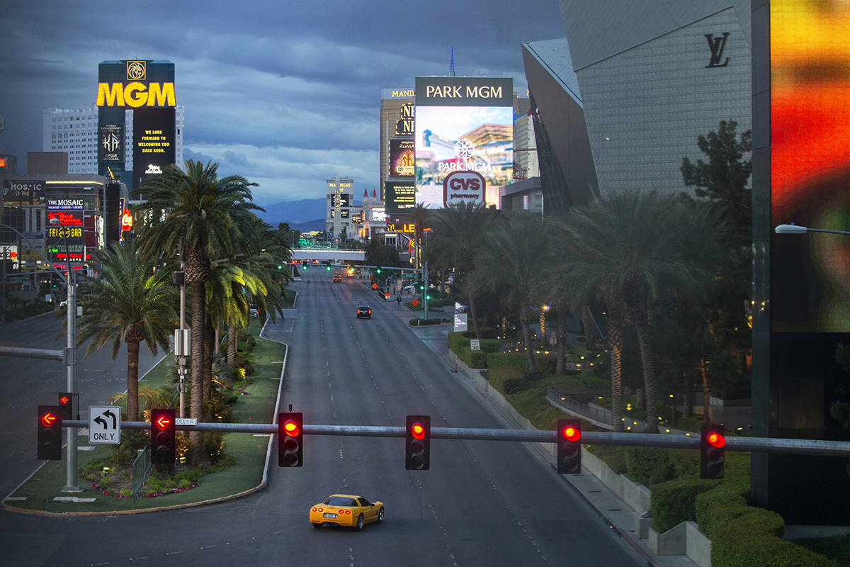 The Las Vegas Strip is largely empty after Gov. Steve Sisolak ordered a mandatory shutdown of m ...