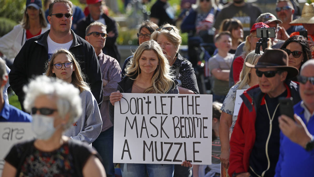 People gather during the Utah Business Revival rally, which wants Utah's economy to be re-opene ...