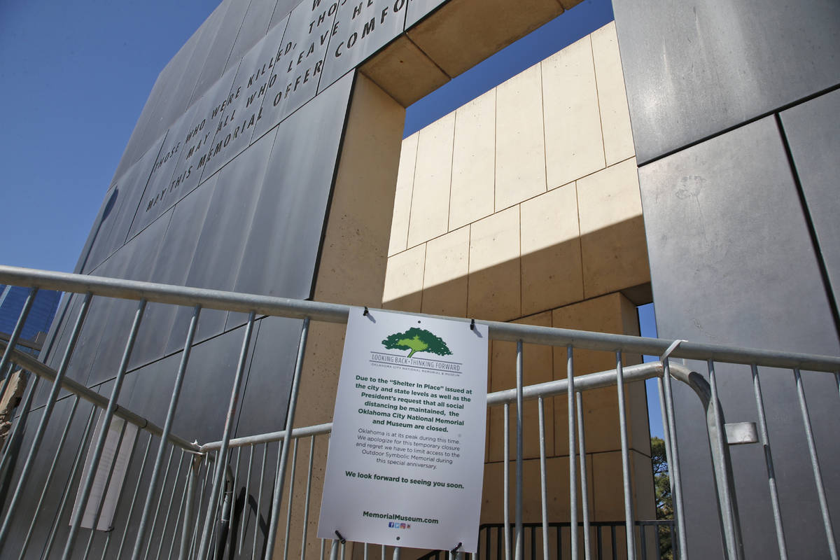 A gate leading to the Oklahoma City National Memorial and Museum is pictured behind a "clo ...
