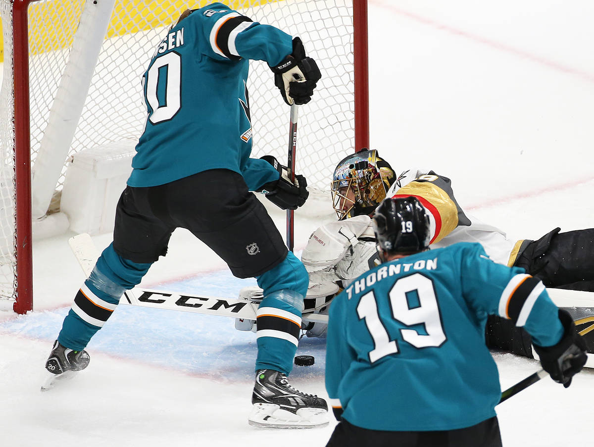 Knights goaltender Marc-Andre Fleury (29) makes a save against San Jose Sharks left wing Marcus ...