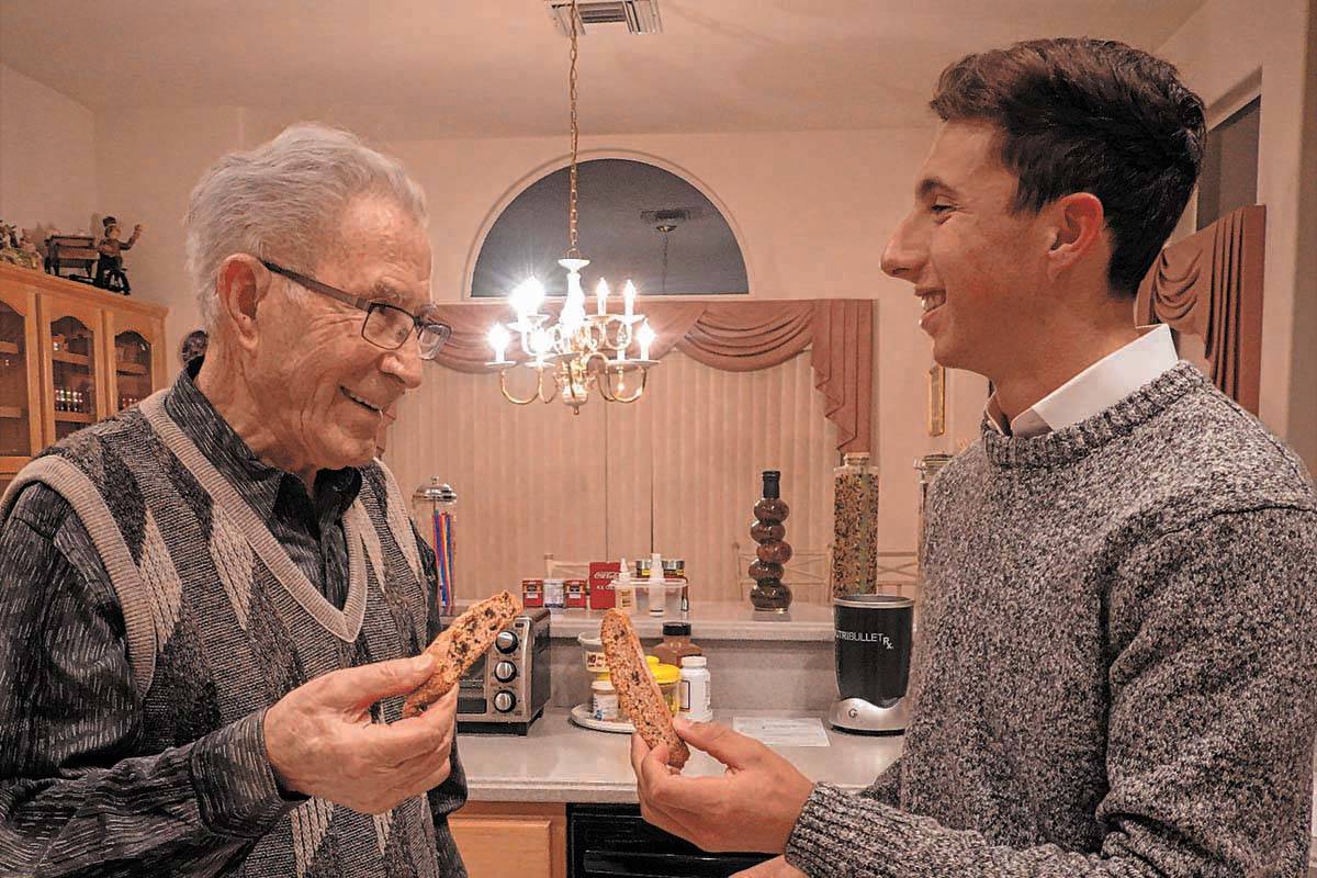 Holocaust survivor Ben Lesser talks with Noah Geeser in a scene from "Live to Bear Witness," a ...