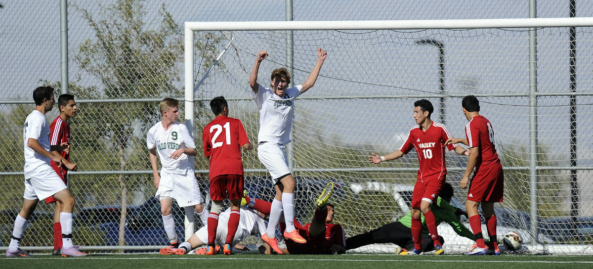 Palo Verde midfielder Erik Karnehed celebrates his winning goal against Valley during the Divis ...