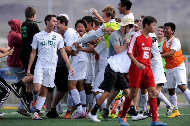 Palo Verde players celebrate their 2-1 victory over Valley in the Division I boys state soccer ...