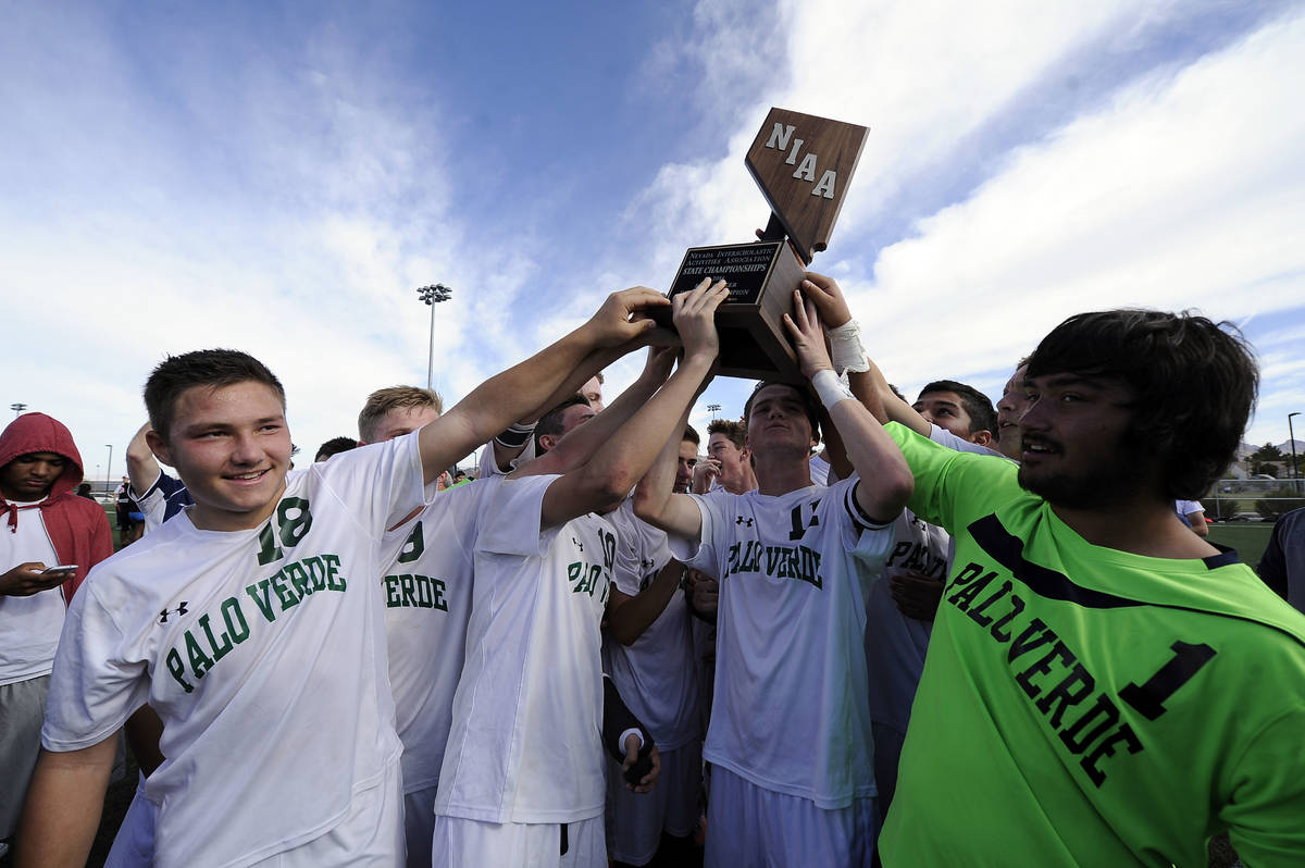 Palo Verde players celebrate their 2-1 victory over Valley in the Division I boys state soccer ...