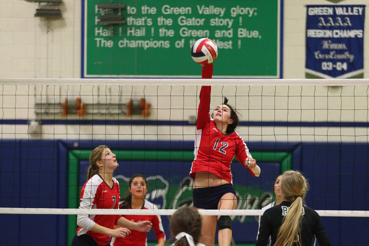 Coronado's Brooke Garlick (12) hits the ball against Palo Verde during the championship game of ...