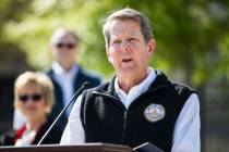 FILE - In this Wednesday, April 1, 2020 file photo, Georgia Gov. Brian Kemp speaks during a new ...
