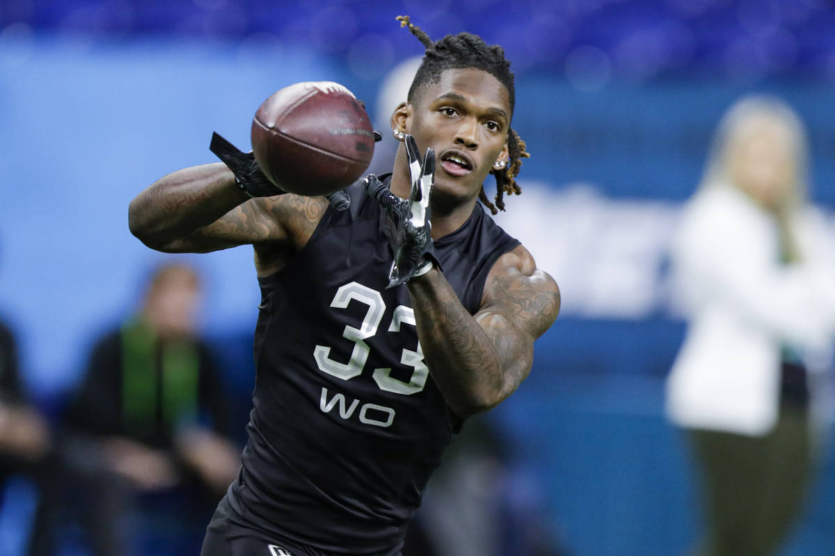 Oklahoma wide receiver Ceedee Lamb runs a drill at the NFL football scouting combine in Indiana ...