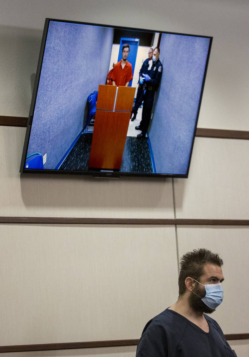 Joshua Nichols, below, appears with co-defendant George Moya on video feed, above, during their ...