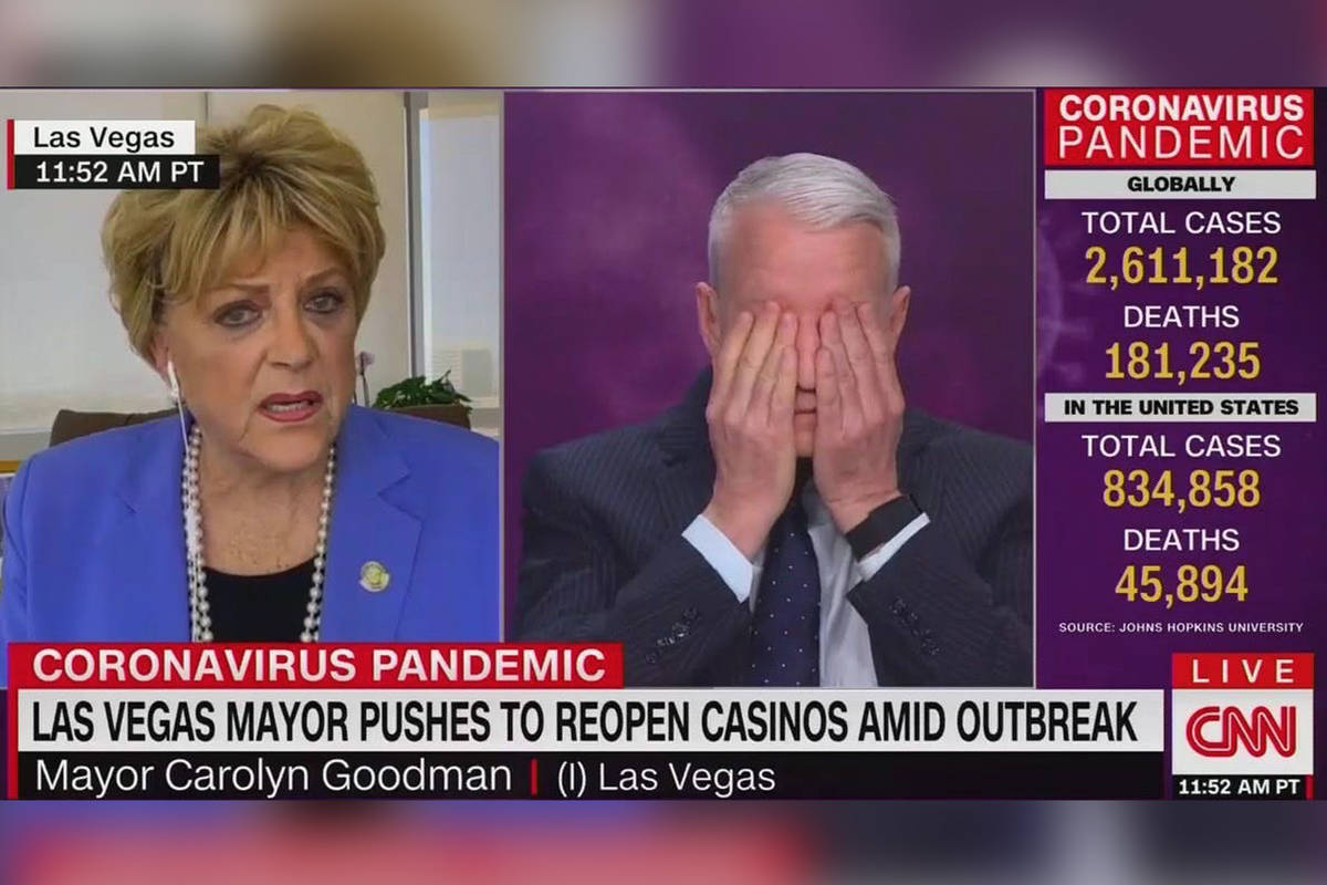 Anderson Cooper reacts during an interview with Las Vegas Mayor Carolyn Goodman during an inter ...