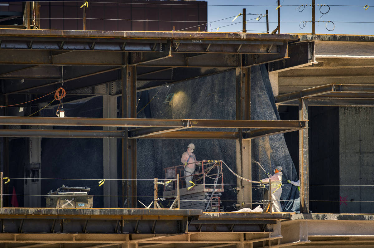 Crews work as construction continues on Resorts World on Tuesday, April 14, 2020 in Las Vegas. ...