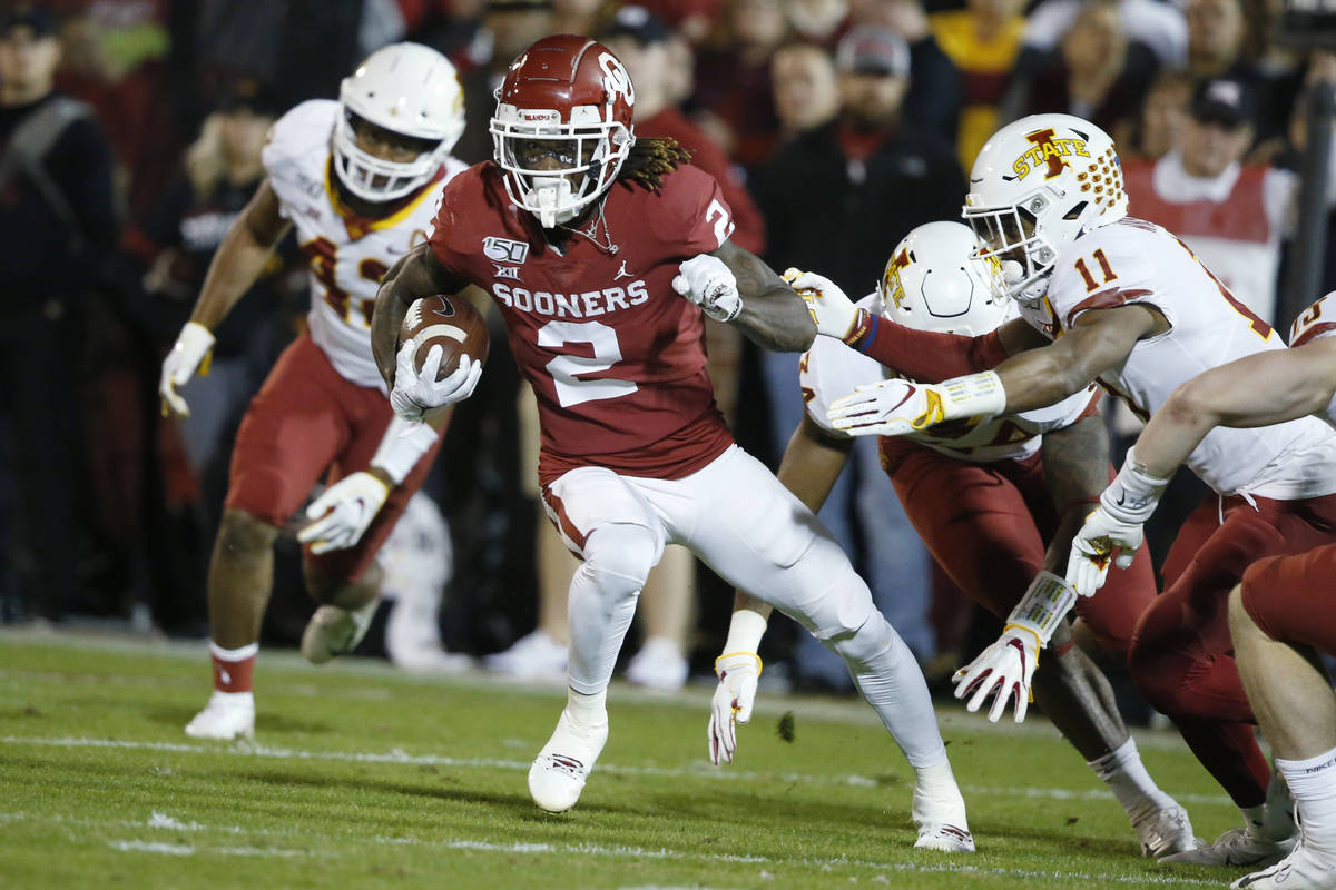FILE - In this Nov. 9, 2019, file photo, Oklahoma wide receiver CeeDee Lamb (2) carries during ...